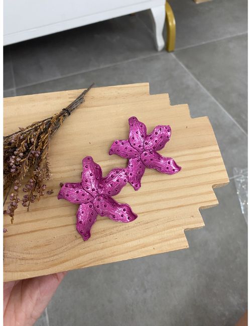 maxi pendientes en forma de estrella de mar en tono buganvilla